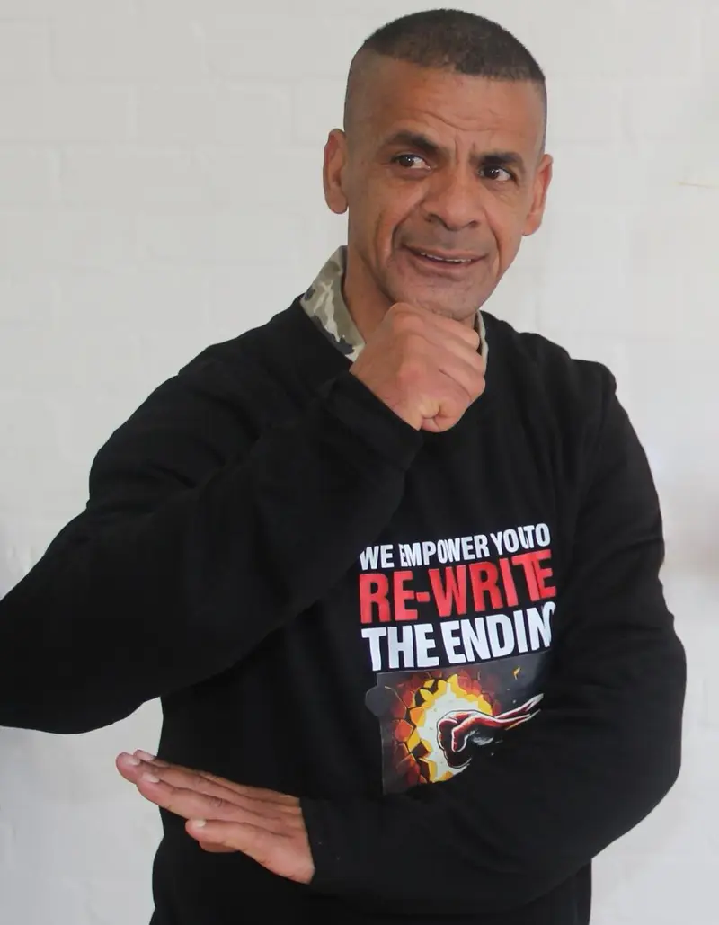 Eugene Adonis in a Rewrite the Ending sweater