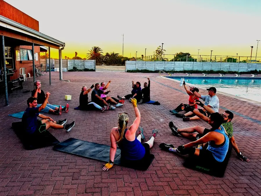 Group floor workout outdoors